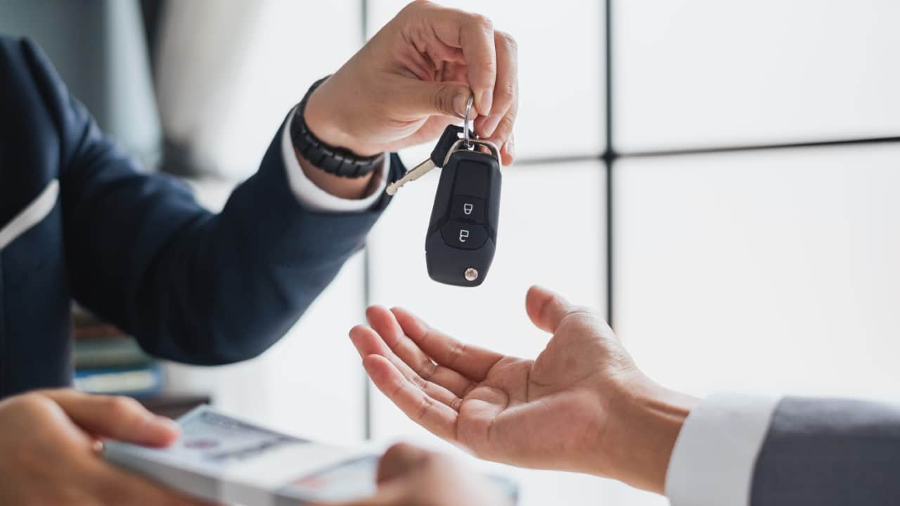 Handing over new car keys