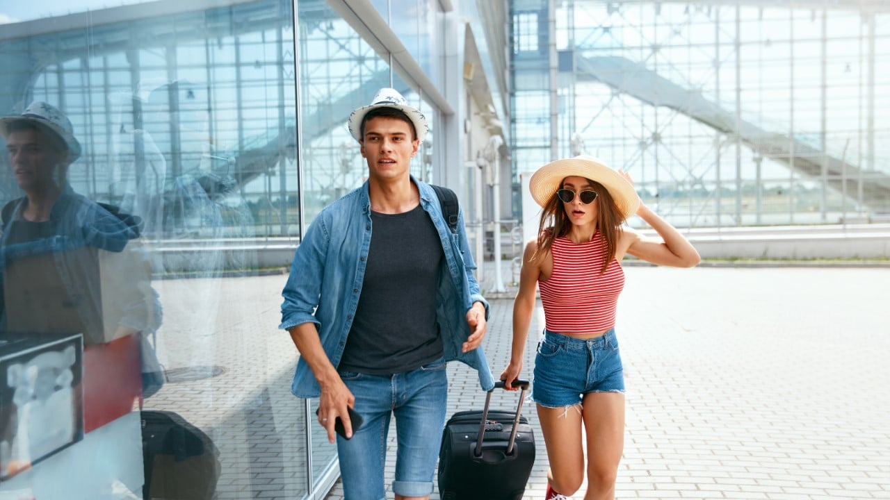 Couple at an airport.