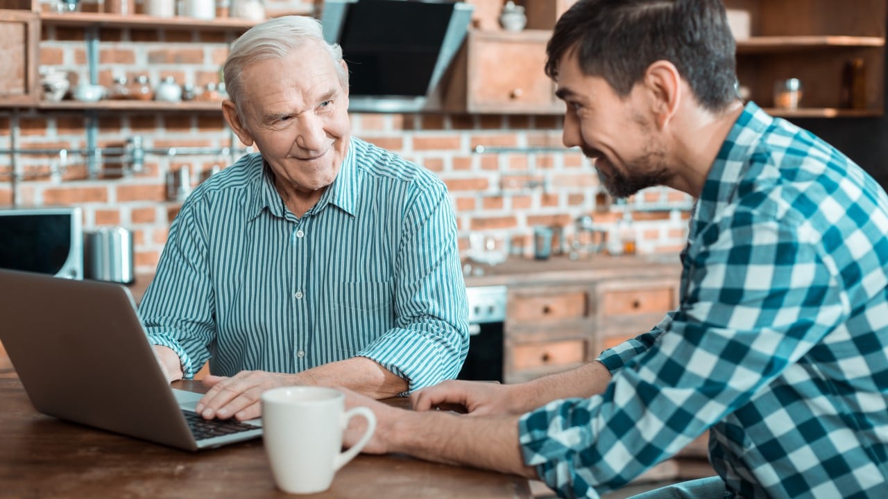 Discussion with elderly man over coffee