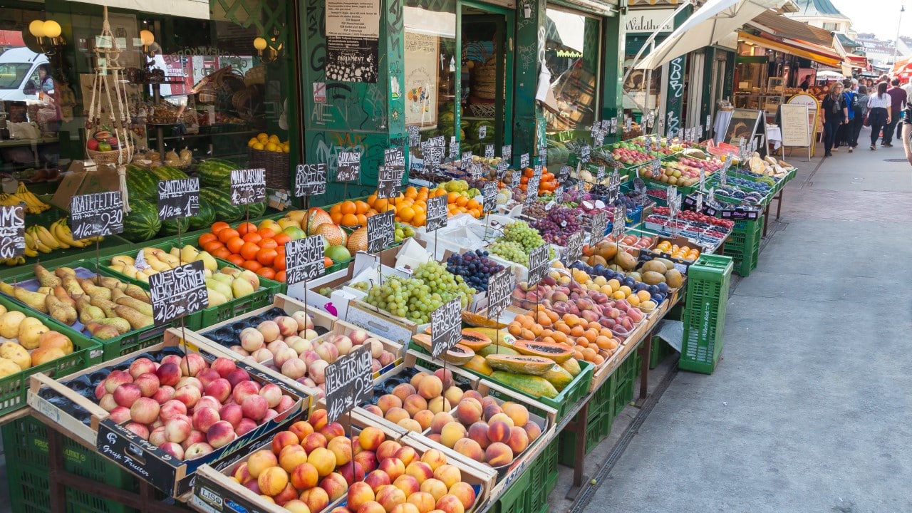 Whole fruits and vegetables for sale at the supermarket