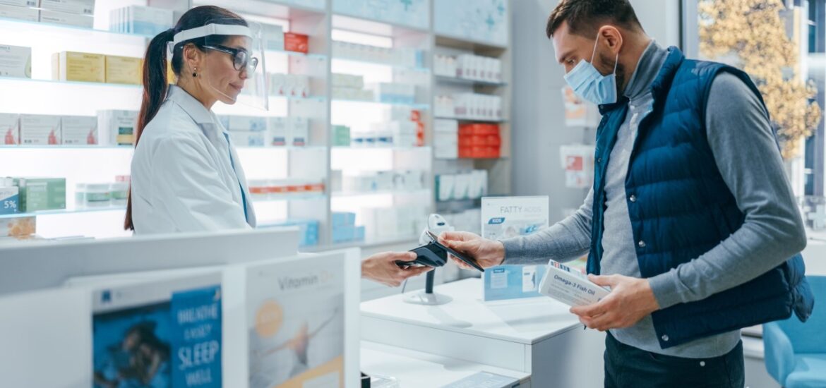 Man Paying Pharmacy