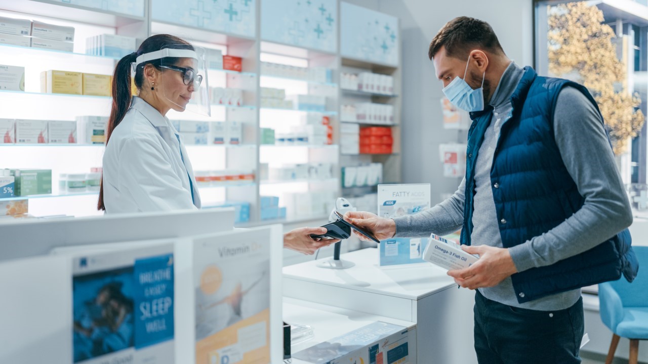 Man Paying Pharmacy