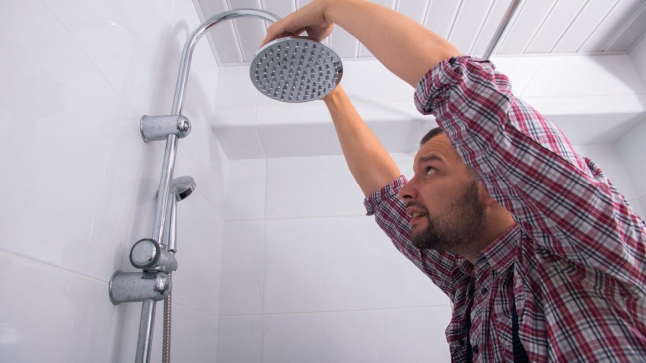 Man fixing shower