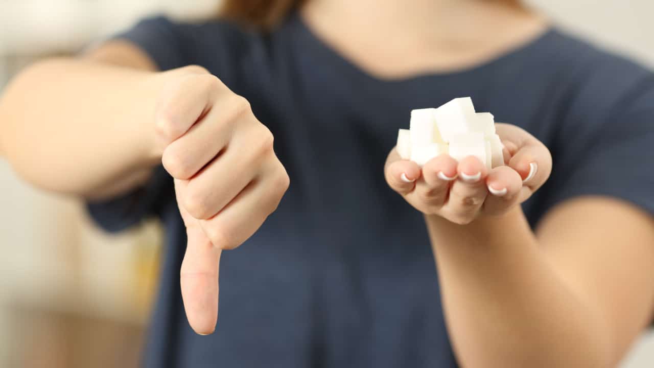 Woman avoiding sugar