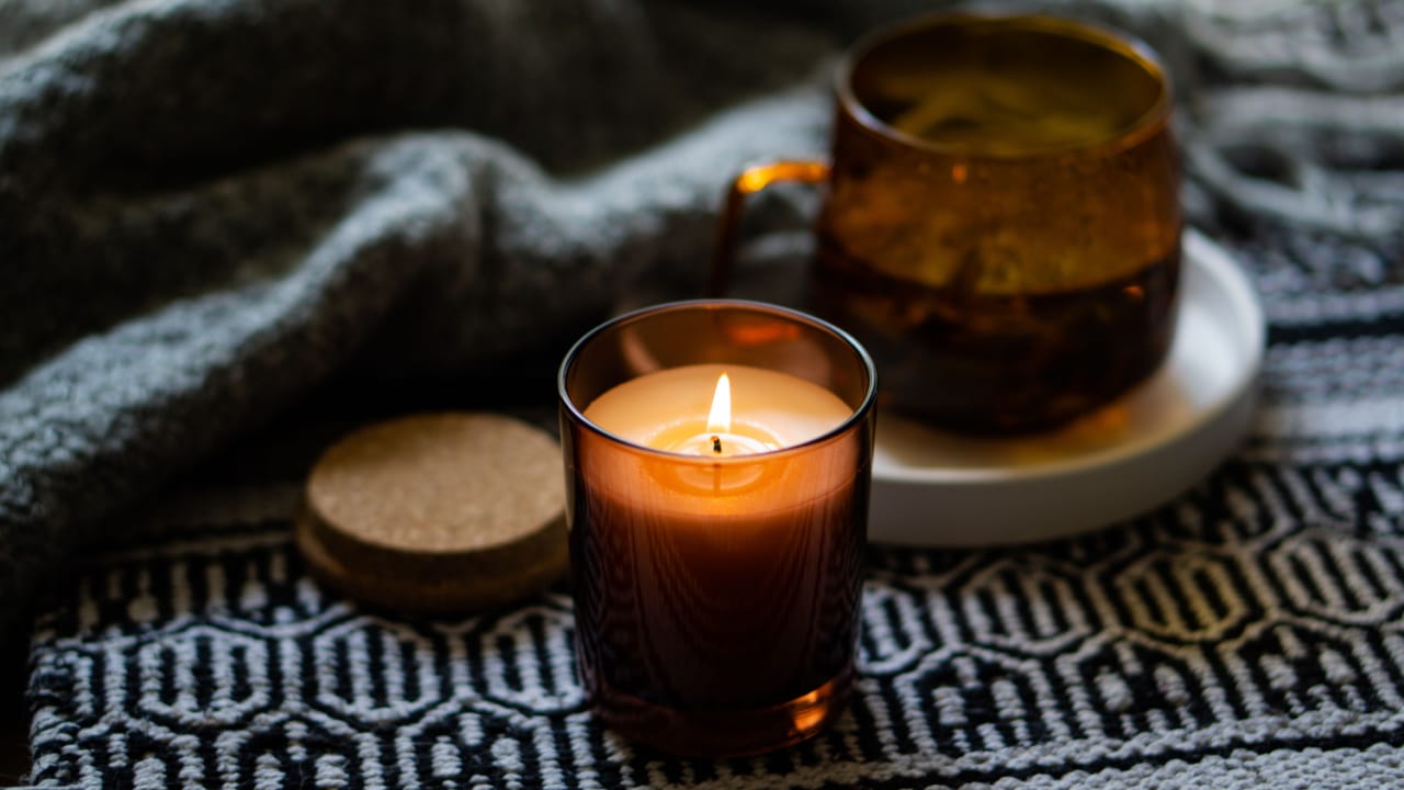 Candle in a glass jar.