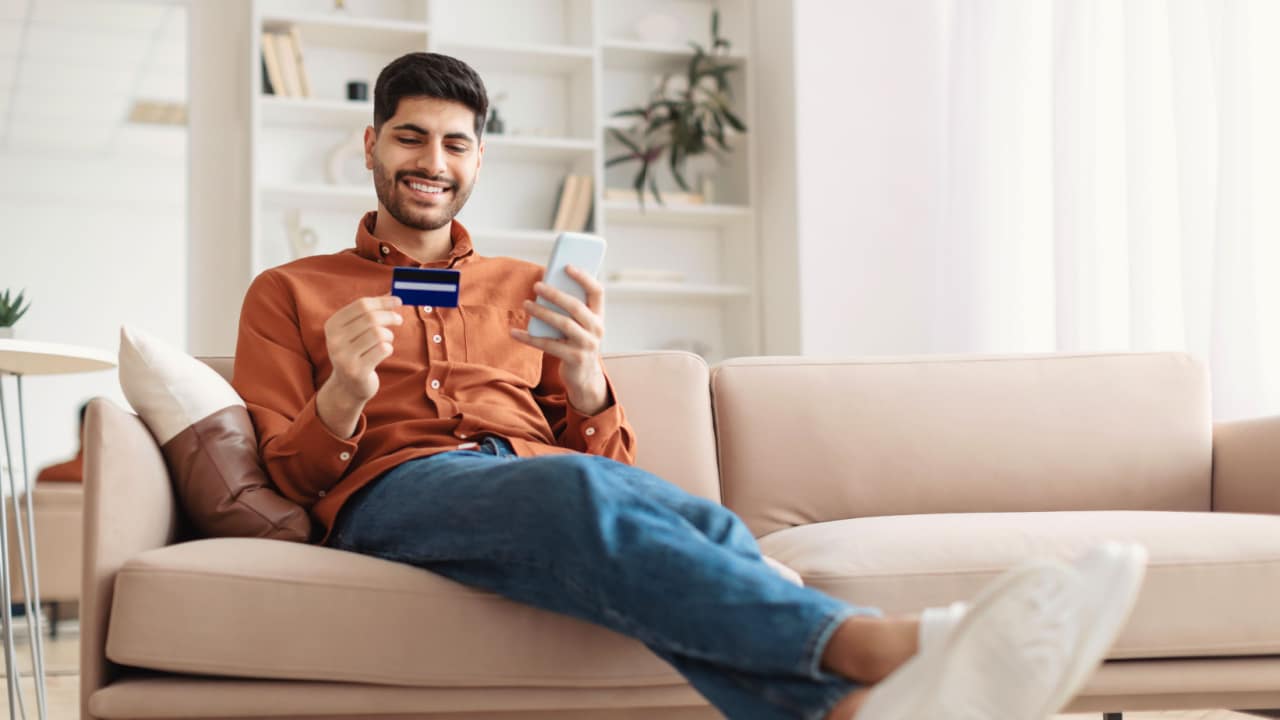 Man paying bill with credit card