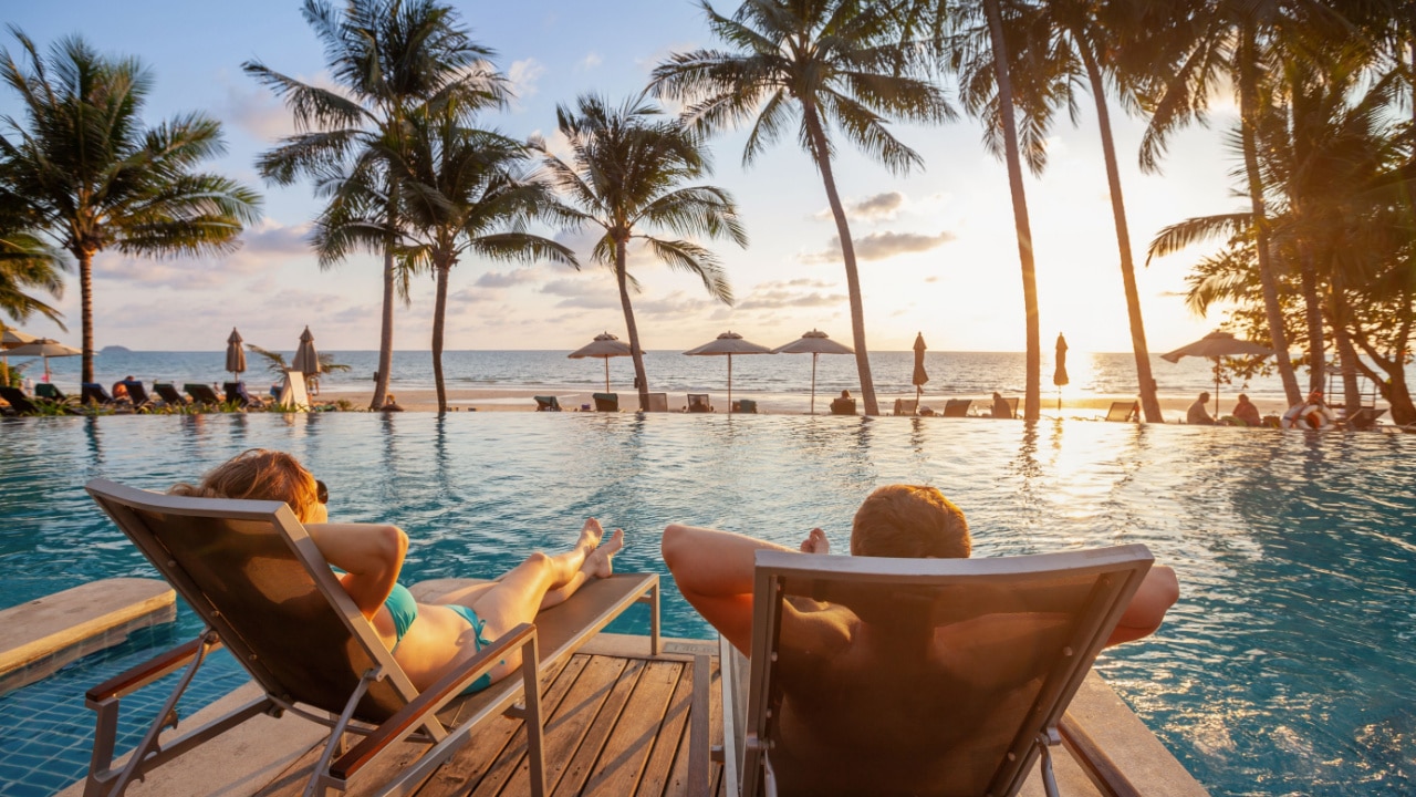 Couple enjoying the poolside view