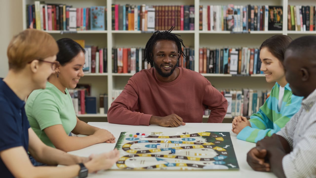 Friends playing a board game.