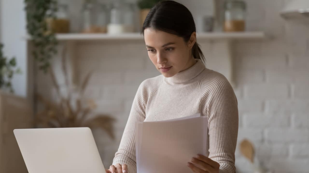 Woman reporting rent and utility payments