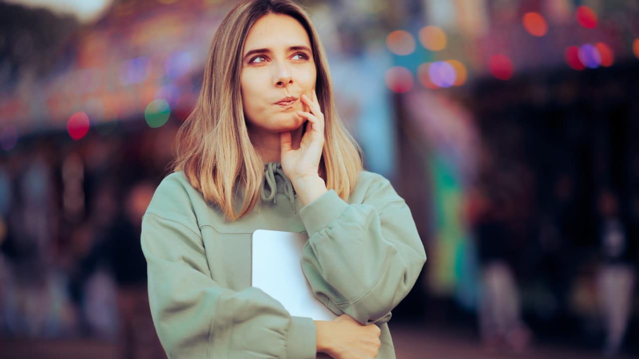 woman lost in thought pondering