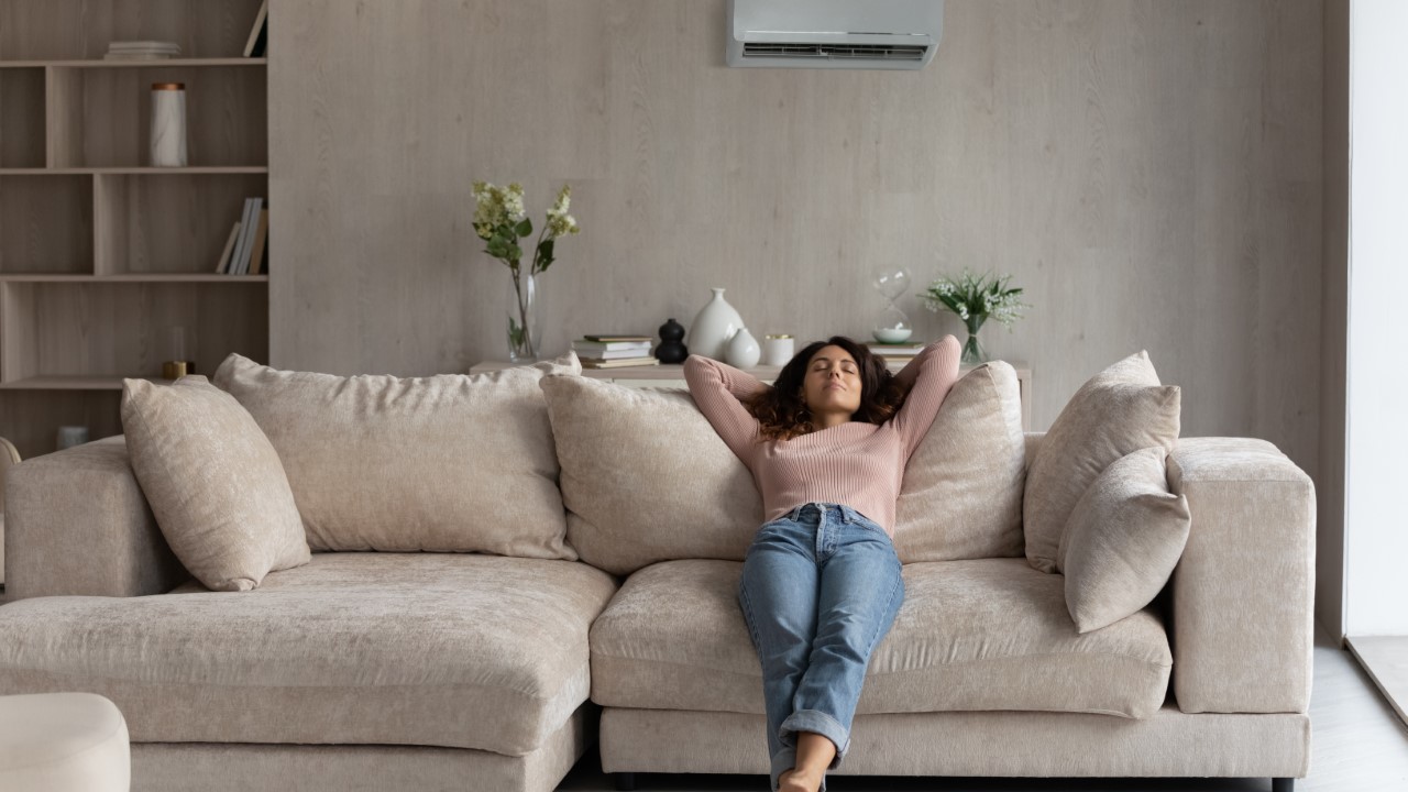 woman relaxing on a sofa