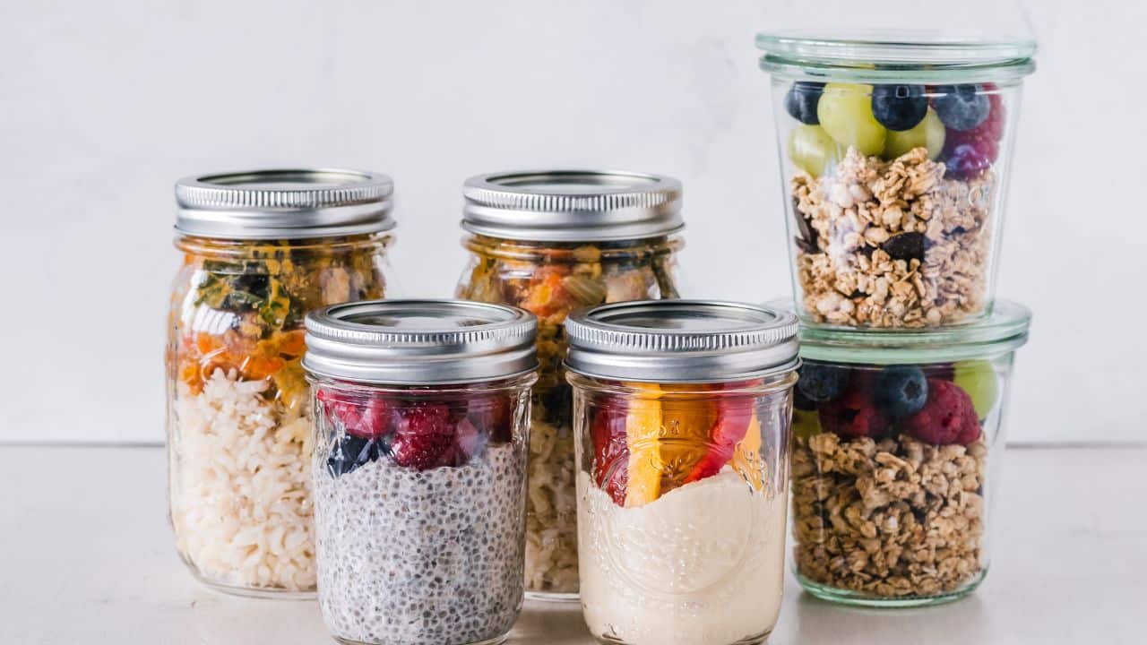 glass jars full of beans and grains