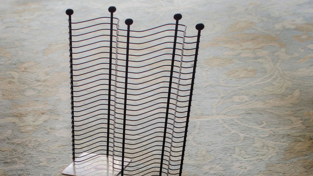 standing black metal CD rack