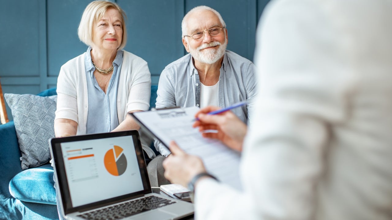 Elderly Couple With Consultant