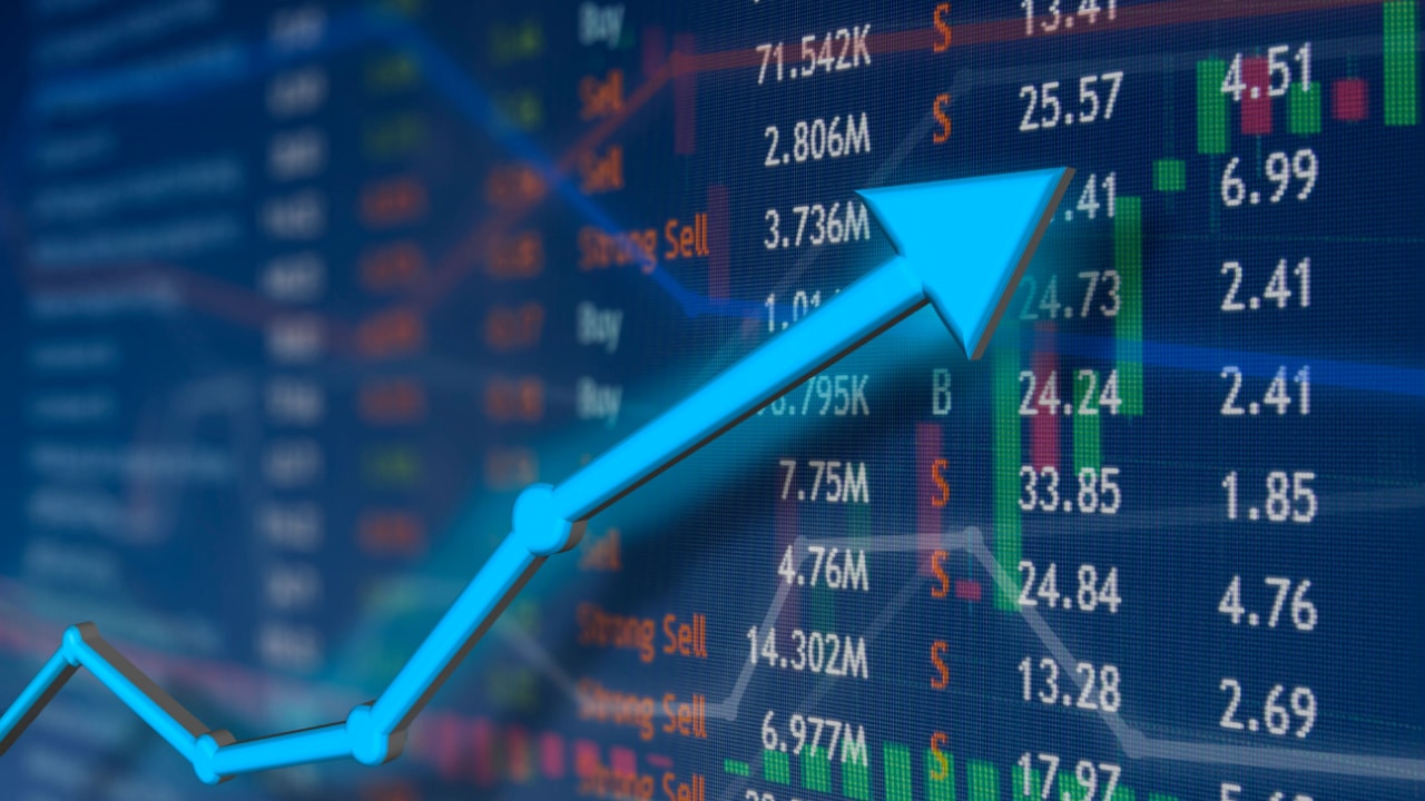 image showing a financial chart with a large blue arrow showing an upward trend