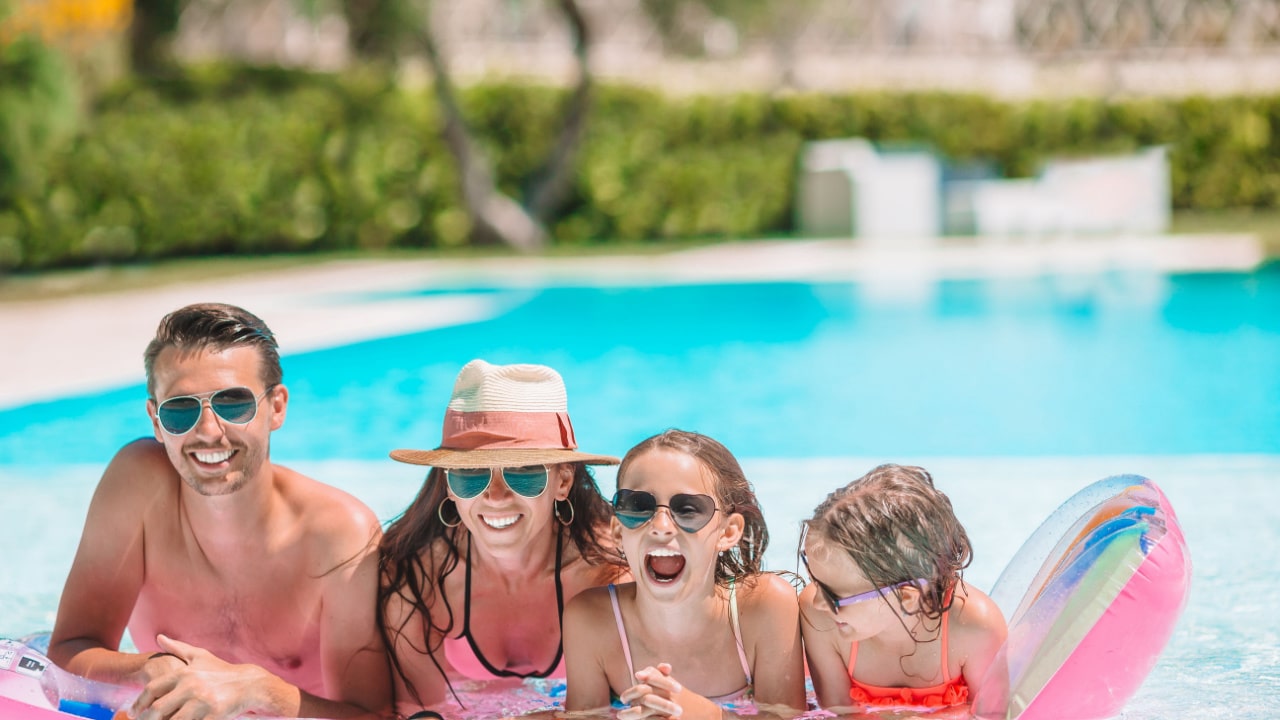 family of four enjoying a vacation