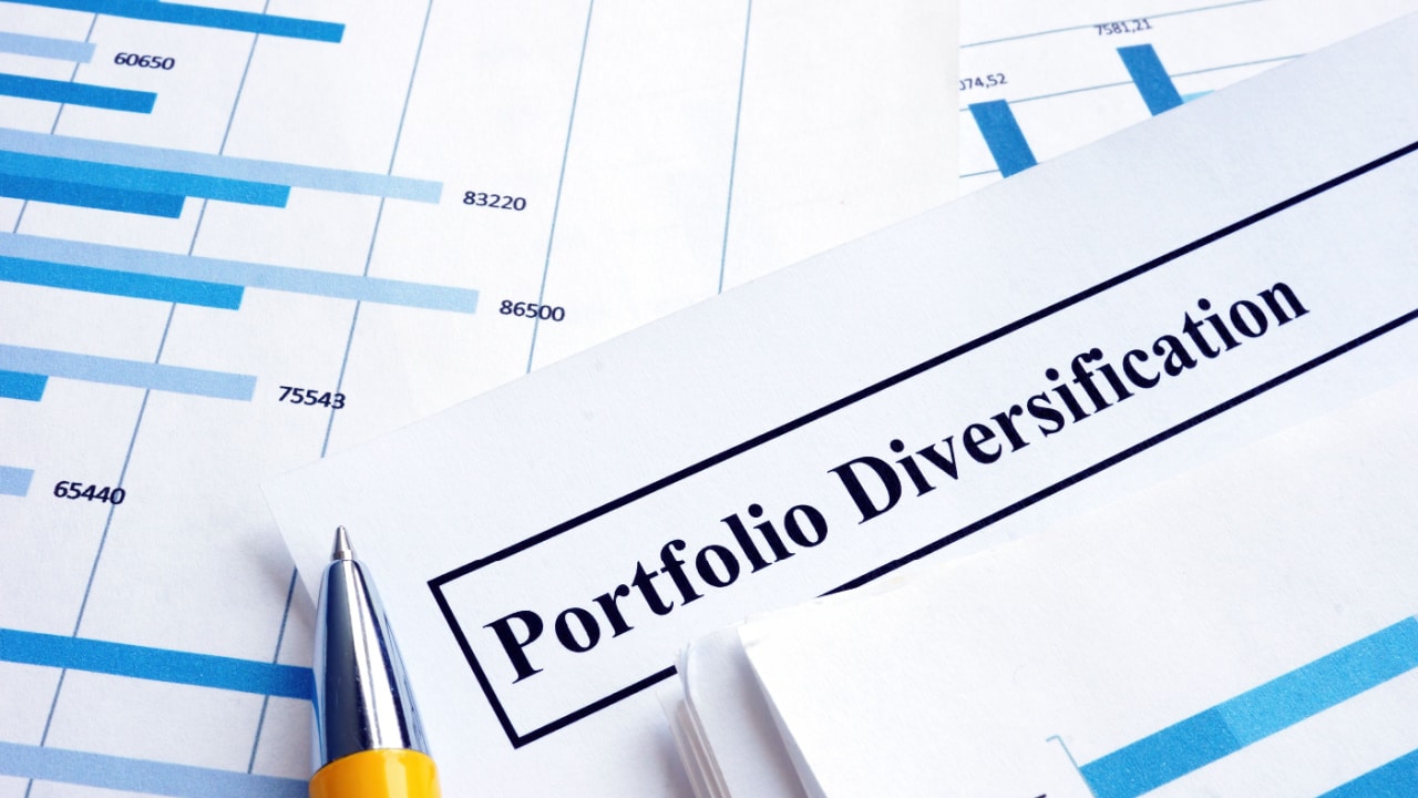 image of investment papers with portfolio diversification
