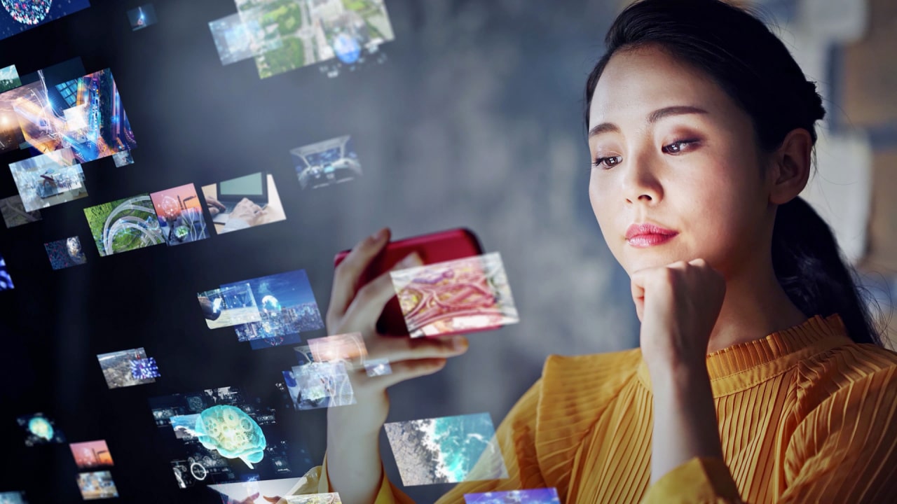 Woman watching youtube videos to study gardening tips