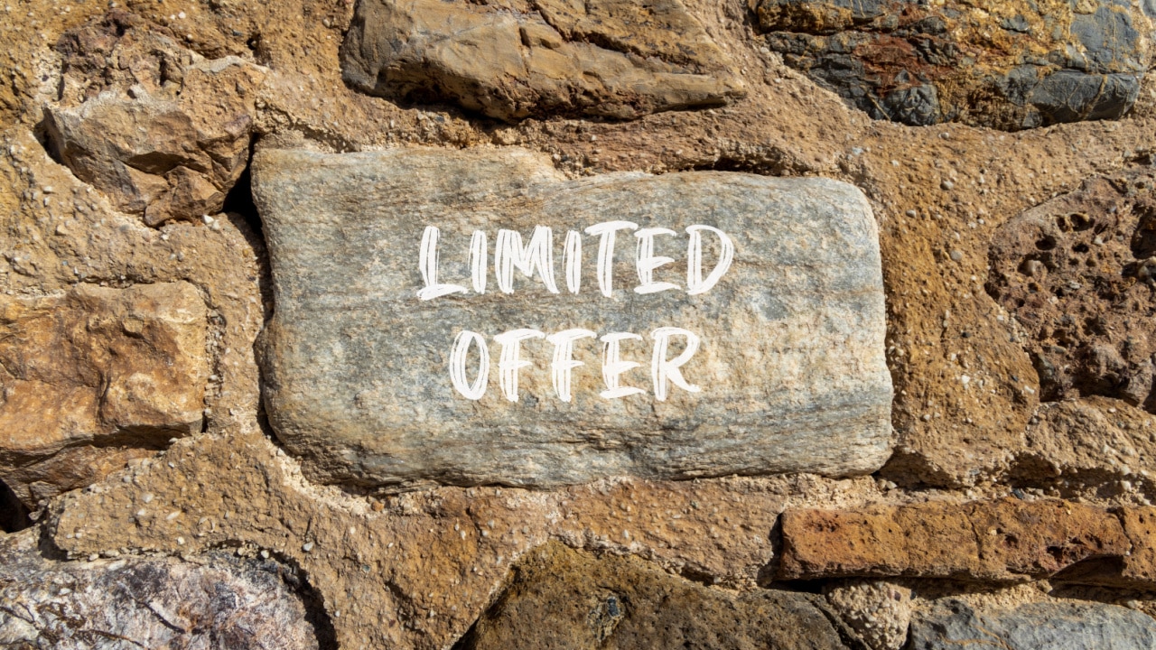 Limited offer written on stone in old wall