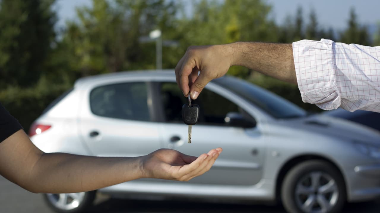 Handing over car key