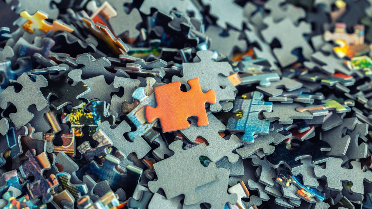 Different Puzzle pieces colorful background
